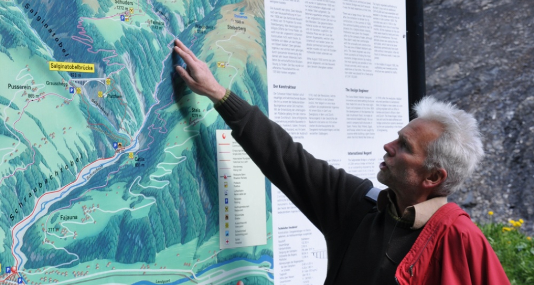 Infotafel zur Salginatobelbrücke bei der Chalchofenhütte Infotafel zur Salginatobelbrücke bei der Chalchofenhütte