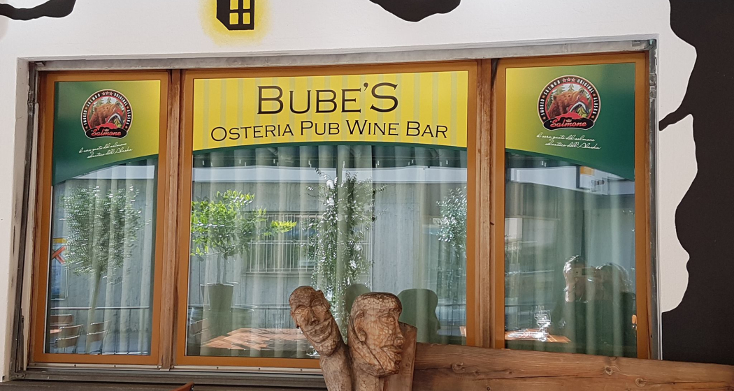The facade of Bube's Pub with one of the artworks on its porch. The facade of Bube's Pub with one of the artworks on its porch.