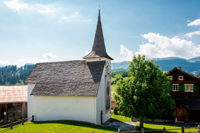 The photo shows the St. Martin chapel looking towards the village center